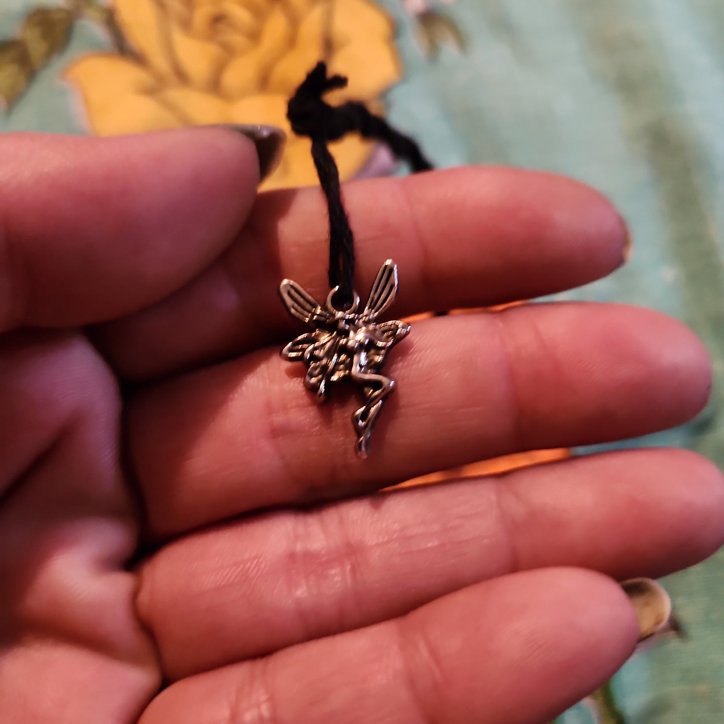 silver tone chip cage pendulum