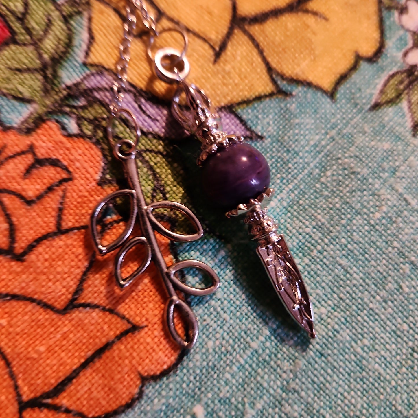 Charoite pendulum with leaf charm