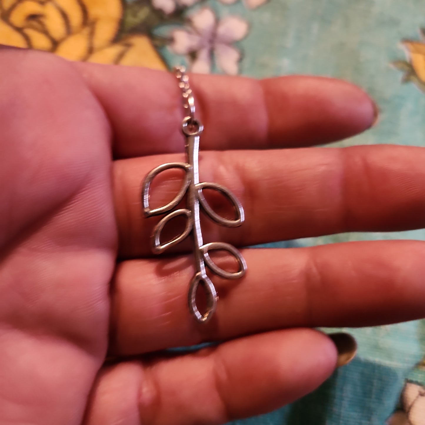 Charoite pendulum with leaf charm