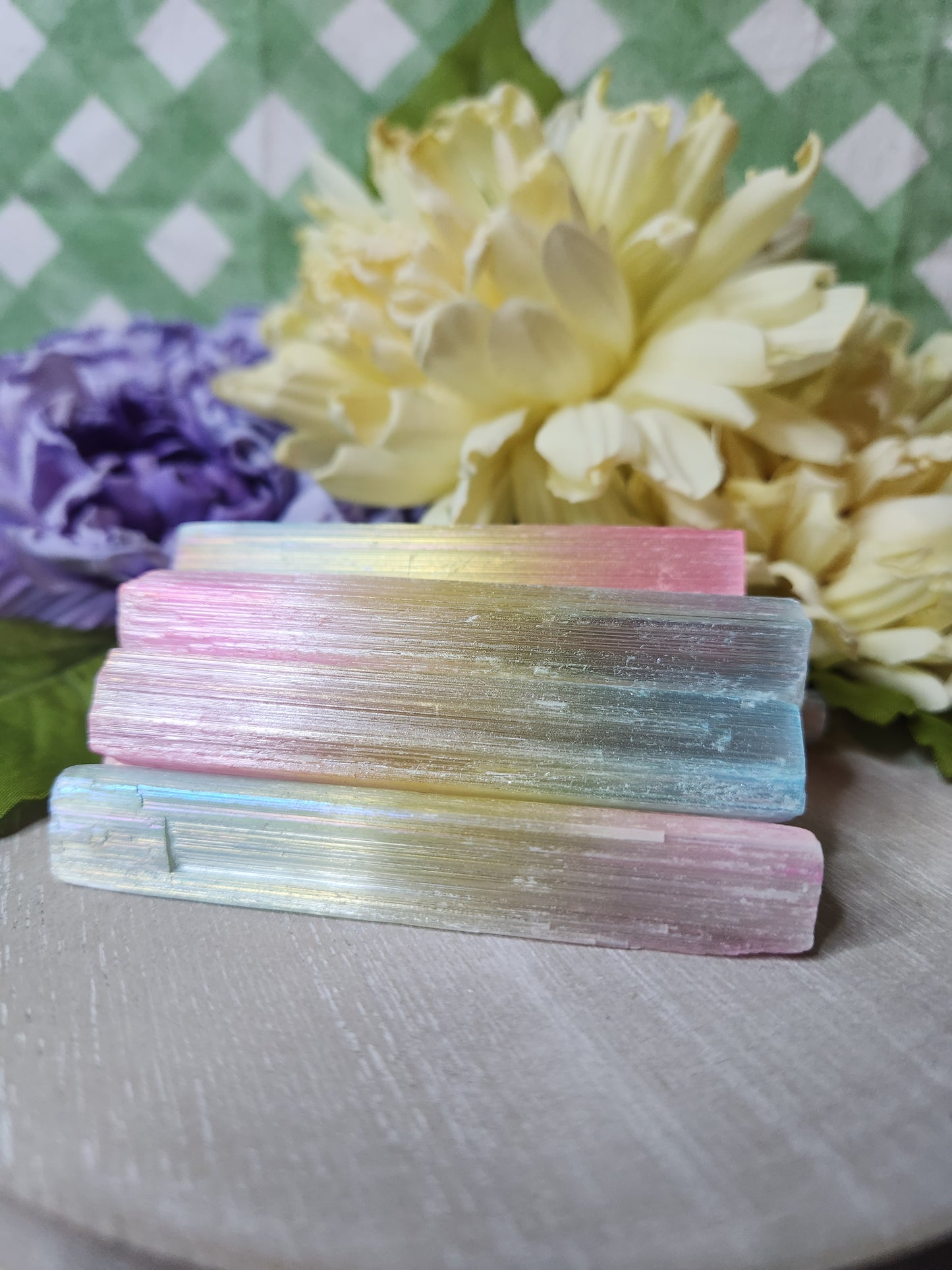 Raw satin spar sticks with rainbow aura coating
