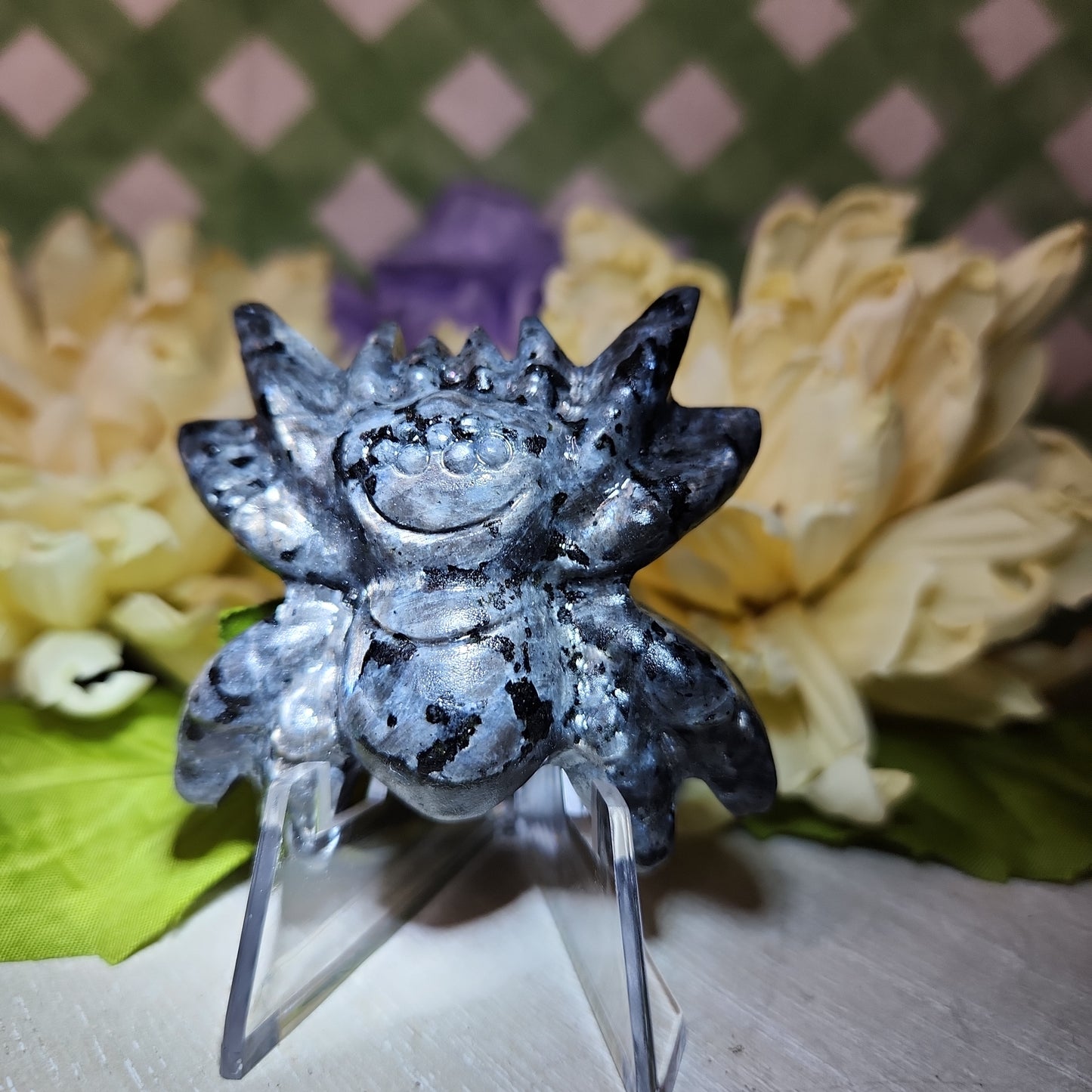 Larvikite spider carving