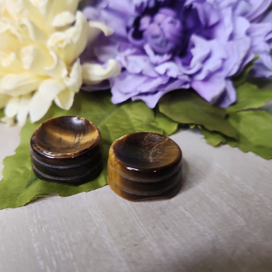 Tiger eye sphere holder carving