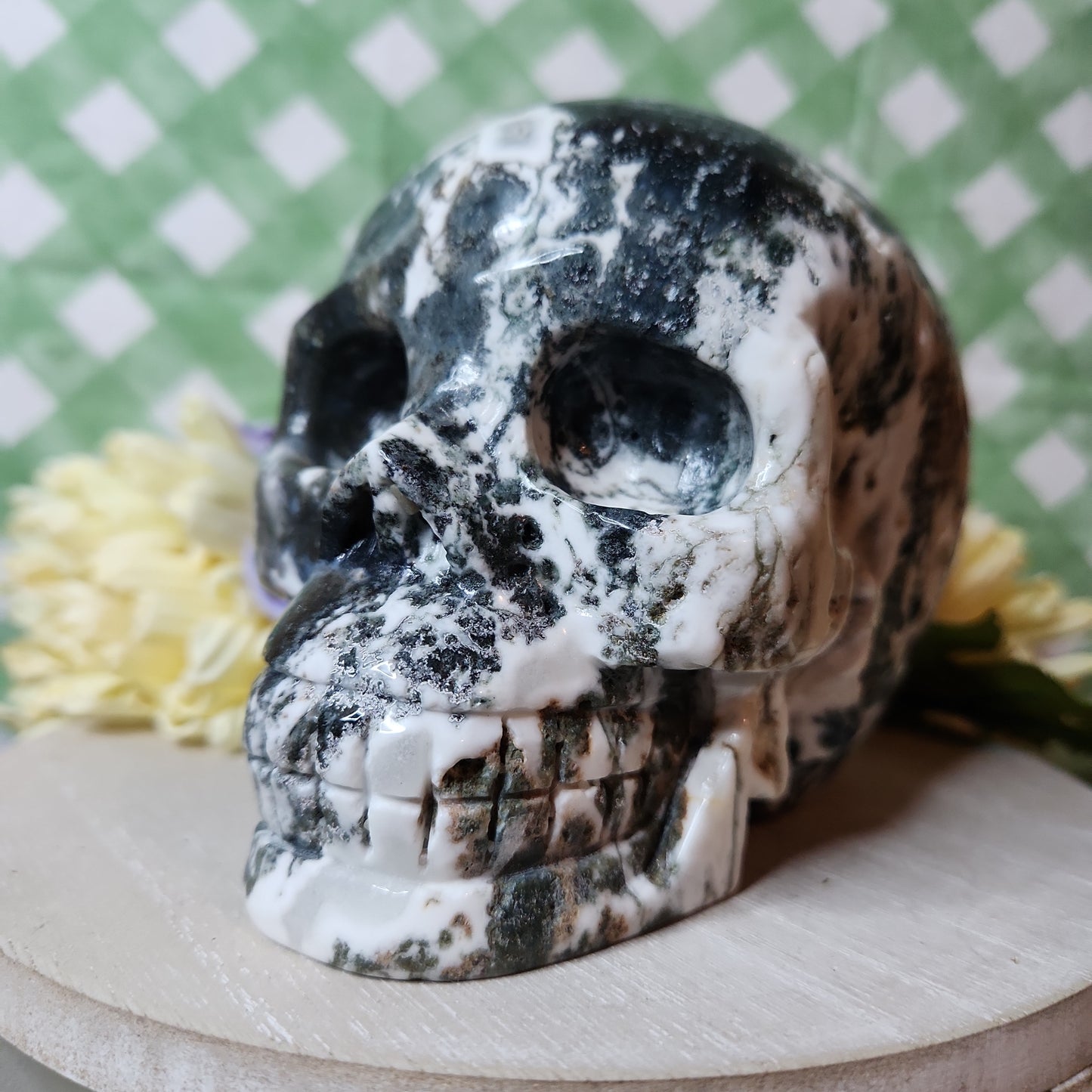 Statement moss agate skull carving