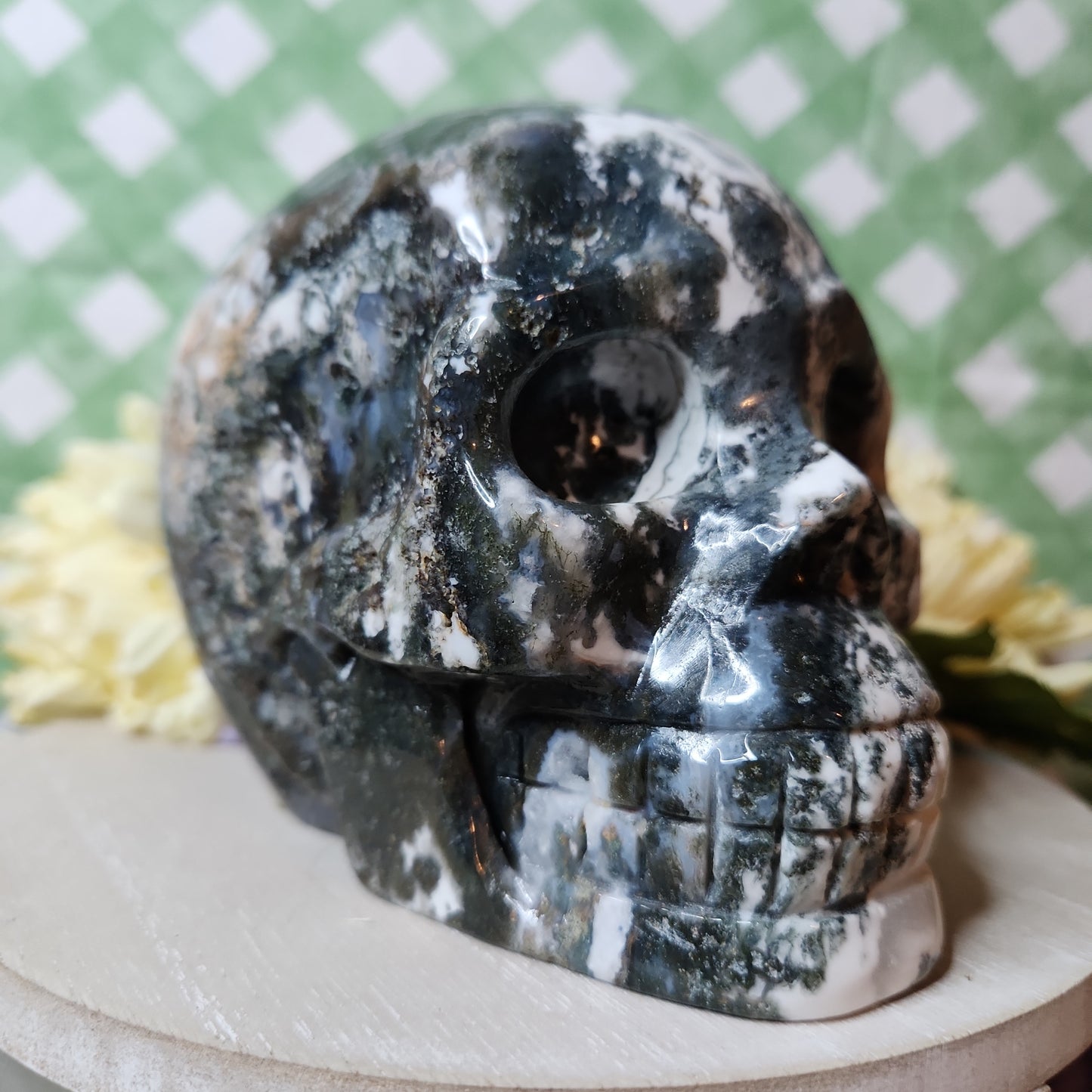 Statement moss agate skull carving