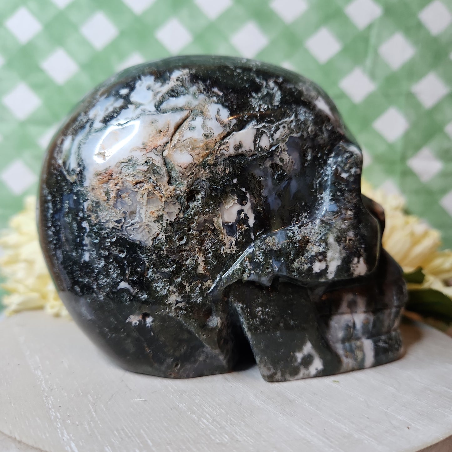 Statement moss agate skull carving