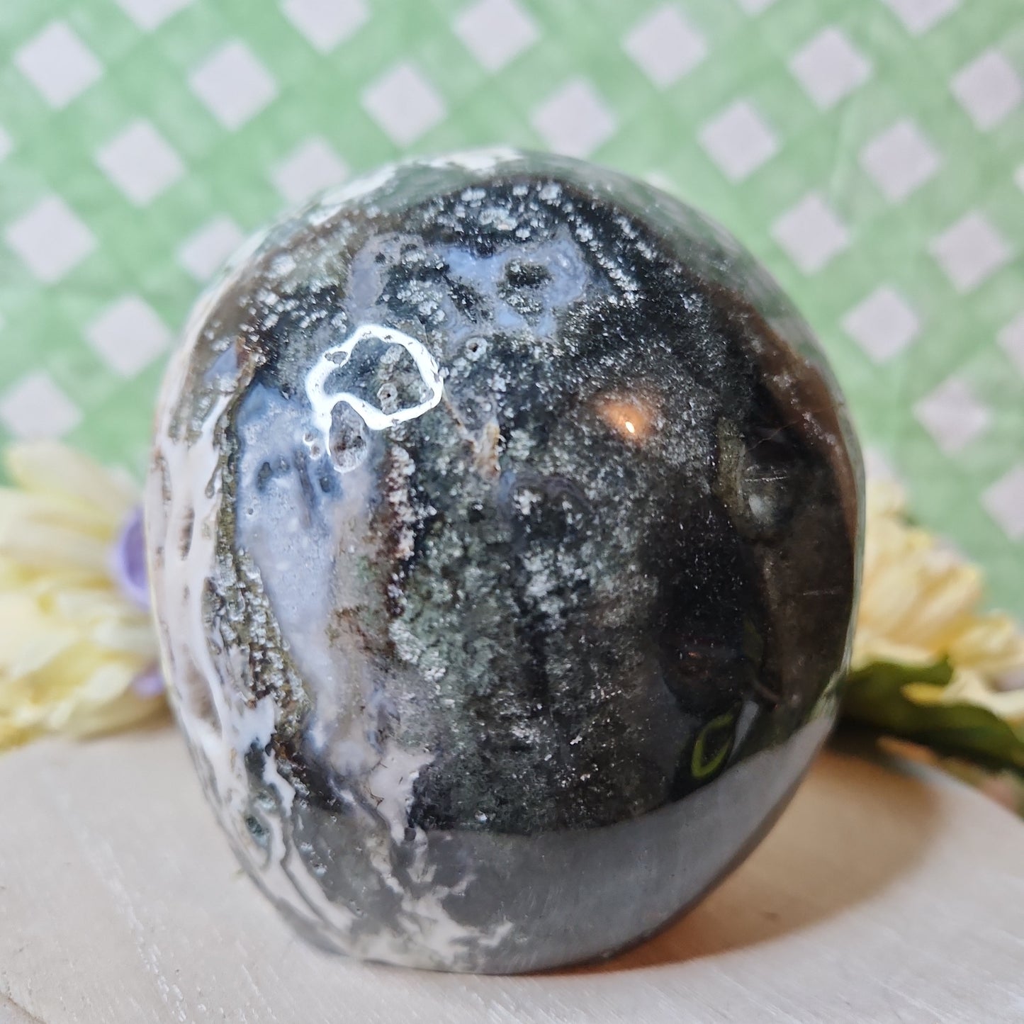 Statement moss agate skull carving