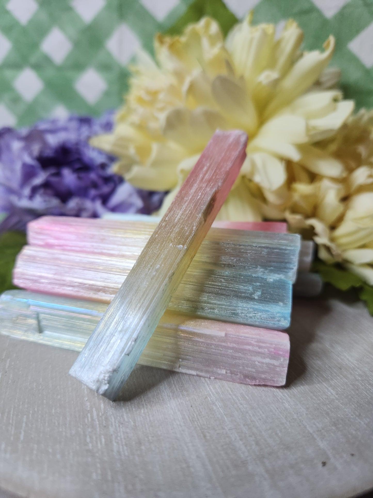 Raw satin spar sticks with rainbow aura coating