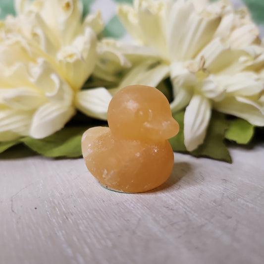 Orange calcite duck carving