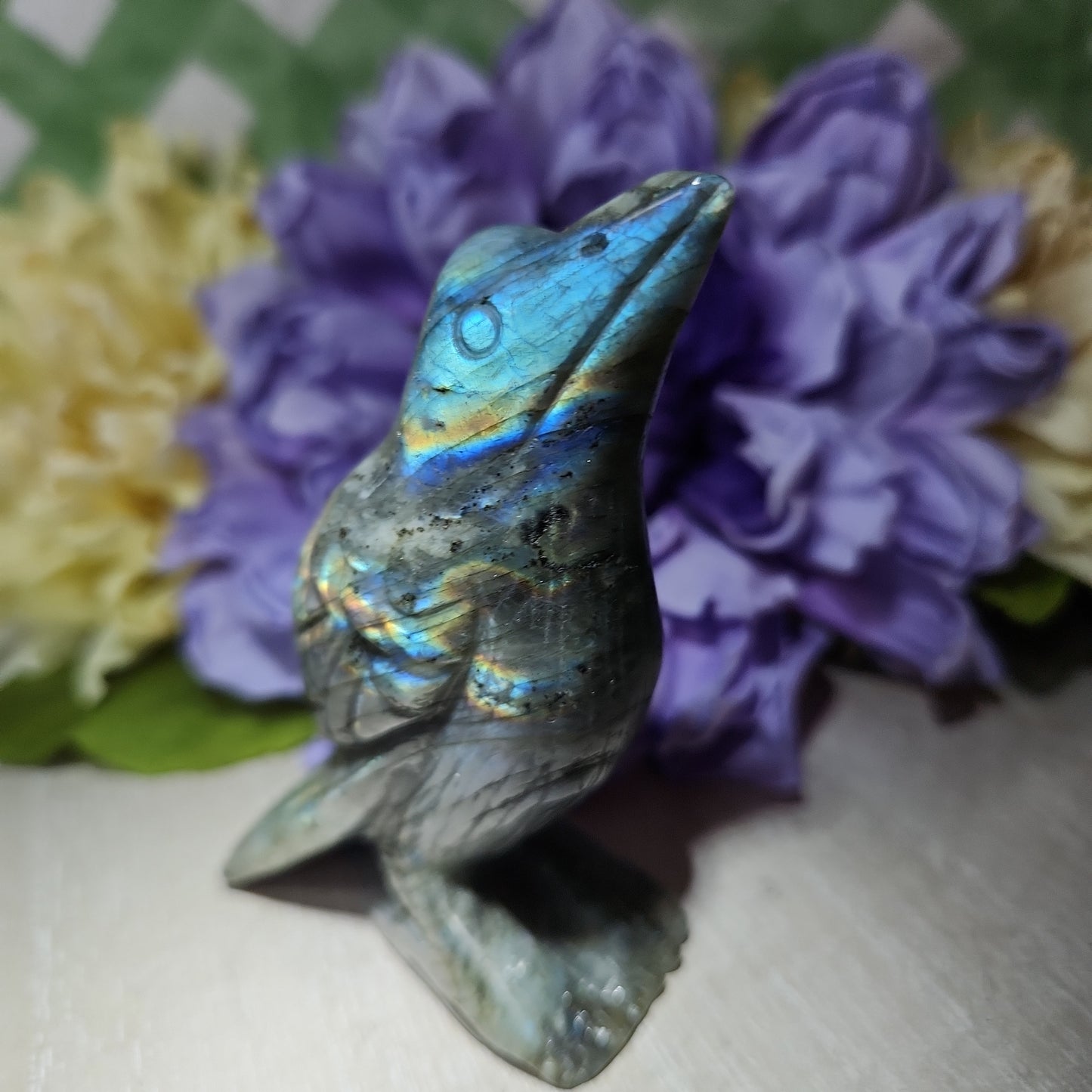 Labradorite crow carving